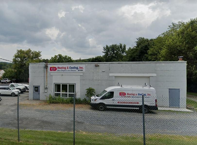 The D&D Heating and Cooling building and service van in Alburtis, PA